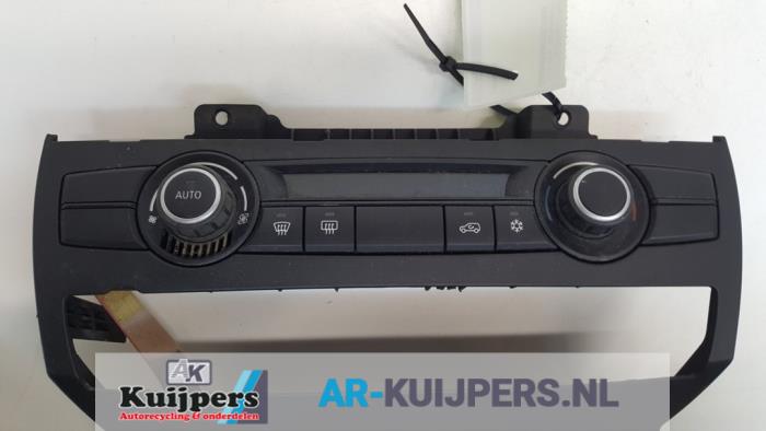 Heater control panel from a BMW X5 (E70) 3.0d 24V 2008