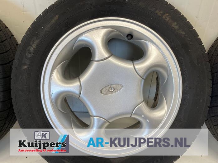 Set of wheels + tyres from a Ford Ka I 1.3i 2003