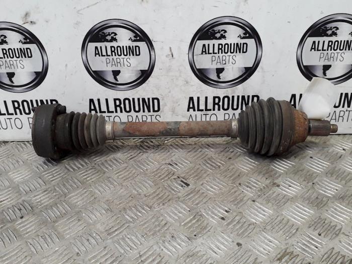 Front drive shaft, left from a Volkswagen Polo V (6R) 1.2 12V 2010