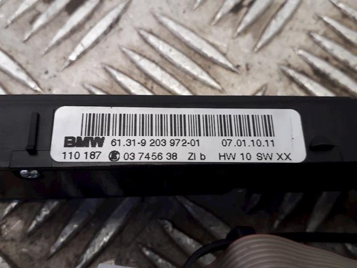 Interruptor PDC de un BMW X1 (E84) sDrive 18d 2.0 16V 2010
