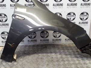 Used Front wing, right Opel Corsa D Price on request offered by AllroundCarParts