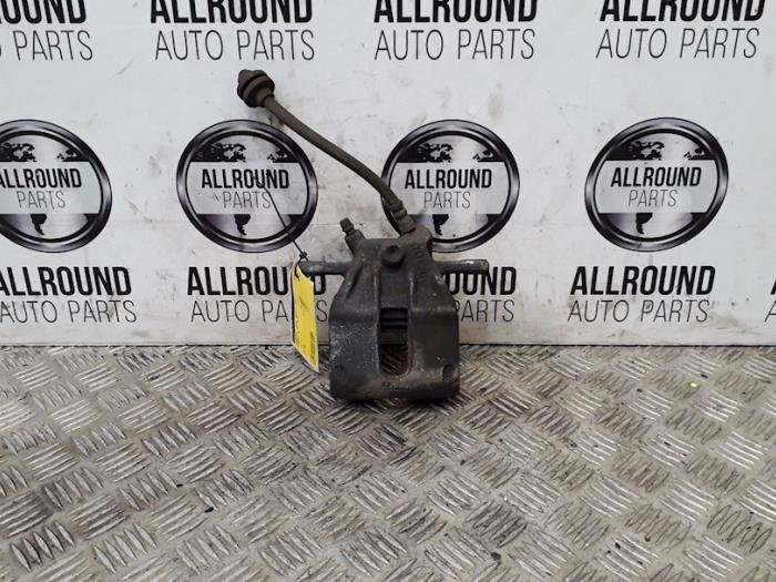 Front brake calliper, right from a Renault Clio IV Estate/Grandtour (7R) 1.5 Energy dCi 90 FAP 2014