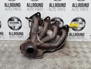Used Exhaust manifold Renault Clio III (BR/CR) 1.4 16V Price on request offered by AllroundCarParts