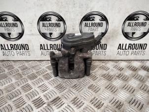Used Rear brake calliper, left Renault Clio IV (5R) Price on request offered by AllroundCarParts