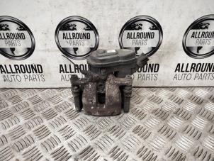 Used Rear brake calliper, left Renault Clio IV (5R) Price on request offered by AllroundCarParts
