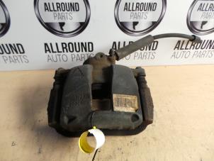 Used Front brake calliper, left Peugeot 307 CC (3B) 1.6 16V Price on request offered by AllroundCarParts