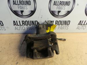 Used Rear brake calliper, left Renault Megane II (LM) Price on request offered by AllroundCarParts