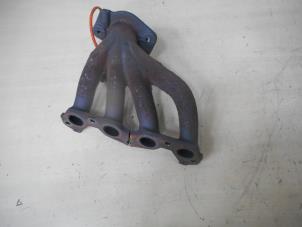 Used Exhaust manifold Renault Clio III (BR/CR) 1.2 16V 75 Price on request offered by AllroundCarParts