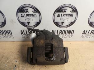 Used Front brake calliper, right Ford Fiesta 5 (JD/JH) Price on request offered by AllroundCarParts