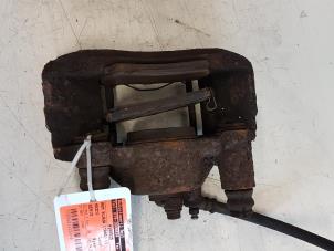 Used Front brake calliper, left Mazda Demio (DW) 1.5 16V Price € 25,00 Margin scheme offered by Autodemontagebedrijf Smit