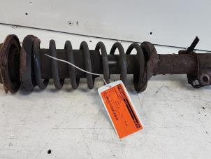 Used Front shock absorber rod, left Mazda Demio (DW) 1.5 16V Price € 35,00 Margin scheme offered by Autodemontagebedrijf Smit