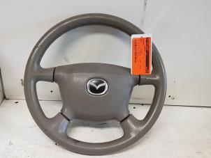 Used Steering wheel Mazda Demio (DW) 1.5 16V Price € 75,00 Margin scheme offered by Autodemontagebedrijf Smit