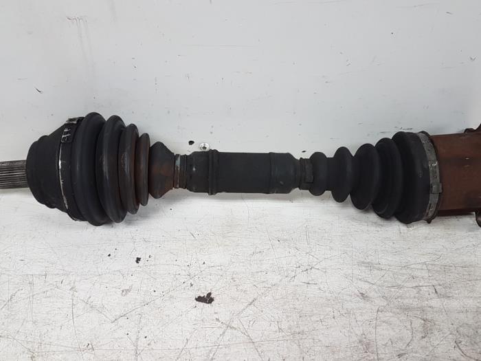 Front drive shaft, left from a Audi A3 2002