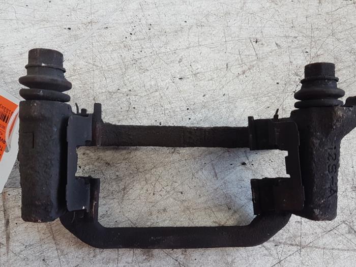 Rear brake calliperholder, left from a Toyota Avensis 2005