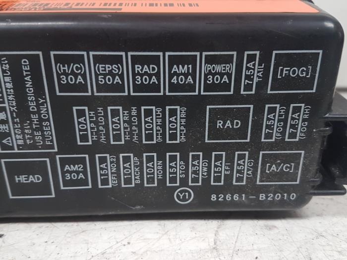 Fuse box from a Daihatsu Cuore (L251/271/276) 1.0 12V DVVT 2003