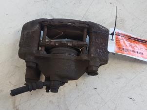 Used Front brake calliper, left Mazda Demio (DW) 1.3 16V Price € 20,00 Margin scheme offered by Autodemontagebedrijf Smit