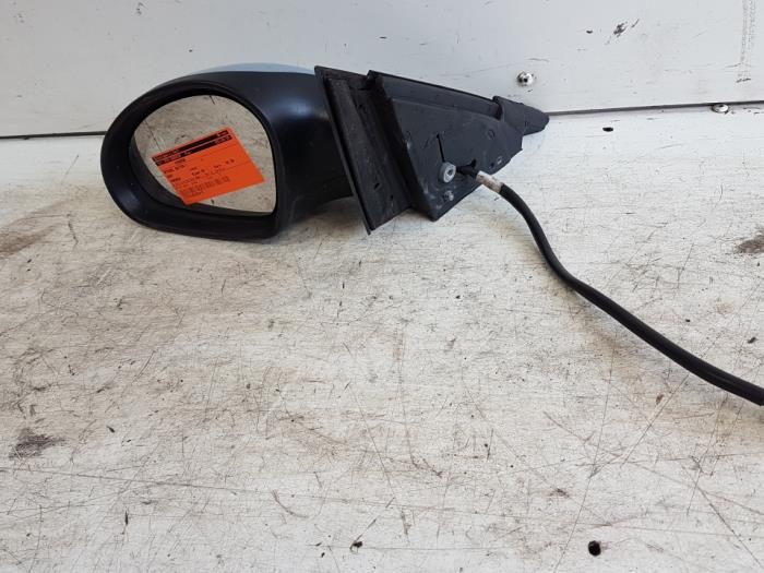 Wing mirror, left from a Seat Cordoba (6L2) 1.4 16V 2004
