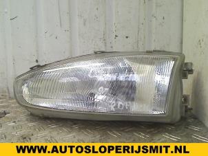 Used Headlight, left Mitsubishi Colt (CJ) 1.3 GL,GLX 12V Price on request offered by Autodemontagebedrijf Smit