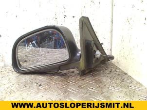 Used Wing mirror, left Mitsubishi Colt (CJ) 1.3 GL,GLX 12V Price on request offered by Autodemontagebedrijf Smit