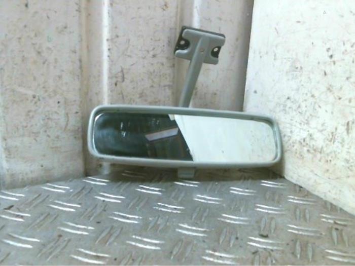 Rear view mirror from a Suzuki Swift (SF310/413) 1.0i 2001