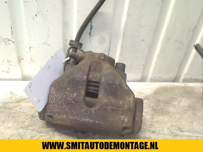 Front brake calliper, left from a Volkswagen Passat (3B2) 1.8 20V 1997
