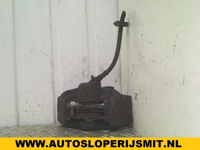 Front brake calliper, left from a Renault Twingo (C06) 1.2 1997