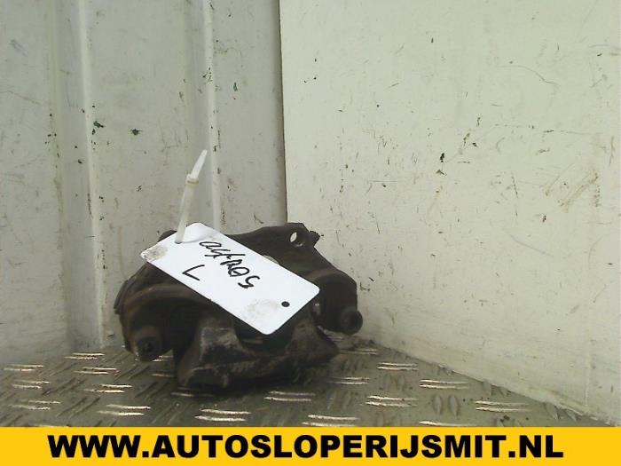 Zacisk hamulcowy lewy tyl z Opel Astra G (F08/48) 2.0 16V 1999