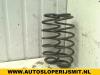 Rear coil spring from a Toyota Yaris (P1), 1999 / 2005 1.0 16V VVT-i, Hatchback, Petrol, 998cc, 50kW (68pk), FWD, 1SZFE, 1999-04 / 2005-09, SCP10 1999