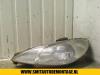 Headlight, left from a Peugeot 206 2000