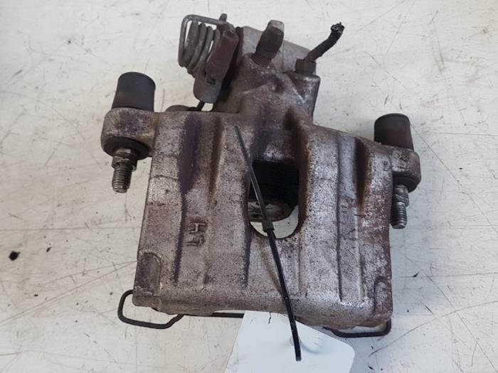 Rear brake calliper, left from a Renault Laguna II Grandtour (KG) 2.0 16V 2005