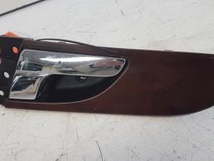 Used Rear door handle 4-door, right Ssang Yong Rexton 2.9 TD RJ 290 Price on request offered by Autodemontagebedrijf Smit