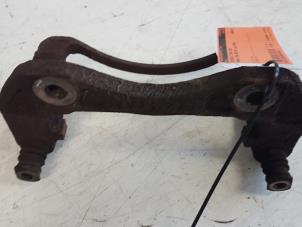 Used Front brake calliperholder, left Ssang Yong Rexton 2.9 TD RJ 290 Price € 30,00 Margin scheme offered by Autodemontagebedrijf Smit