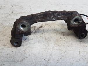 Used Rear brake calliperholder, left Mazda 3 Sport (BK14) Price € 15,00 Margin scheme offered by Autodemontagebedrijf Smit
