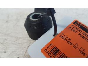 Klopfsensor van een Fiat Grande Punto (199) 1.4 2005