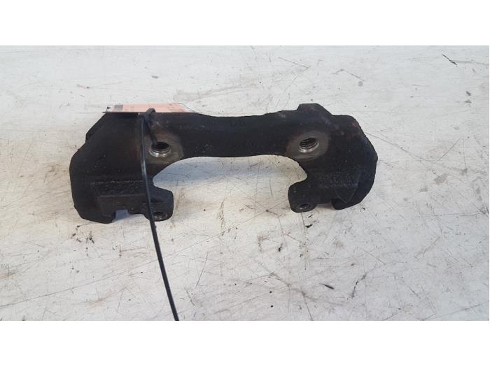 Front brake calliperholder, right from a Ford Transit Connect 1.8 TDCi 75 2009