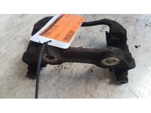 Used Front brake calliperholder, left Citroen C4 Coupé (LA) 1.6 HDi 16V 110 Price € 10,00 Margin scheme offered by Autodemontagebedrijf Smit