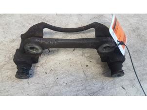 Used Front brake calliperholder, left Toyota Yaris (P1) 1.0 16V VVT-i Price € 10,00 Margin scheme offered by Autodemontagebedrijf Smit
