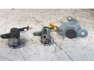 Ignition lock + computer from a Hyundai Accent 1.4i 16V 2006
