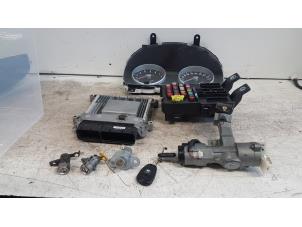 Ignition lock + computer from a Hyundai Accent 1.4i 16V 2006