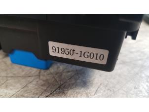 Ignition lock + computer from a Hyundai Accent 1.4i 16V 2006