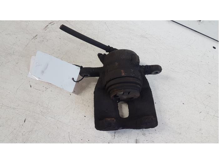 Front brake calliper, left from a Nissan Micra (K12) 1.5 dCi 68 2006