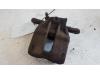 Front brake calliper, right from a Renault Clio III (BR/CR) 1.2 16V 75 2006