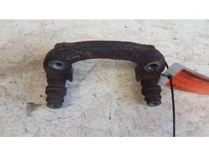 Used Rear brake calliperholder, left Mitsubishi Colt (Z2/Z3) 1.3 16V Price € 15,00 Margin scheme offered by Autodemontagebedrijf Smit
