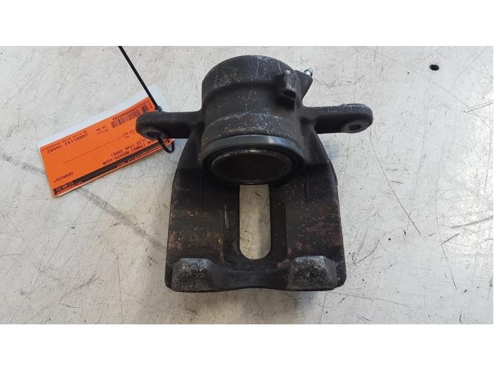 Front brake calliper, right from a Renault Clio III (BR/CR) 1.2 16V 75 2008