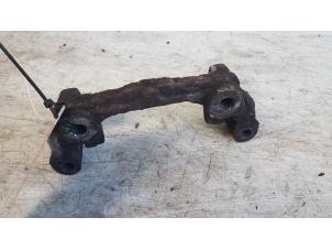 Used Rear brake calliperholder, left Mazda 3 (BK12) 1.6 CiTD 16V Price € 15,00 Margin scheme offered by Autodemontagebedrijf Smit