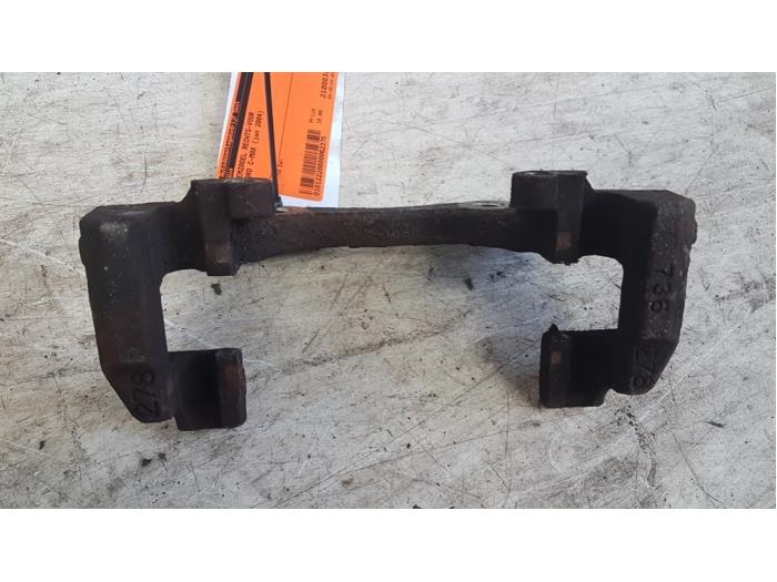 Front brake calliperholder, right from a Ford Focus C-Max 1.8 16V 2004