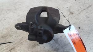 Used Front brake calliper, left Opel Corsa D 1.2 16V Price € 15,00 Margin scheme offered by Autodemontagebedrijf Smit