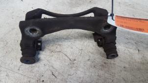Used Front brake calliperholder, left Toyota Aygo (B10) 1.0 12V VVT-i Price € 5,00 Margin scheme offered by Autodemontagebedrijf Smit