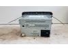 Reproductor de CD y radio de un Skoda Fabia II (5J) 1.2 TDI 12V Greenline 2012