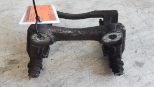 Used Front brake calliperholder, left Nissan Micra (K12) 1.2 16V Price € 10,00 Margin scheme offered by Autodemontagebedrijf Smit